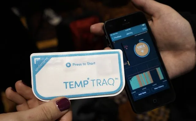 The TempTraq body temperature wearable bluetooth thermometer and its accompanying app are displayed at the International Consumer Electronics show (CES) in Las Vegas, Nevada January 4, 2015. The TempTraq is designed to take a child's temperature constantly in real time. (Photo by Rick Wilking/Reuters)
