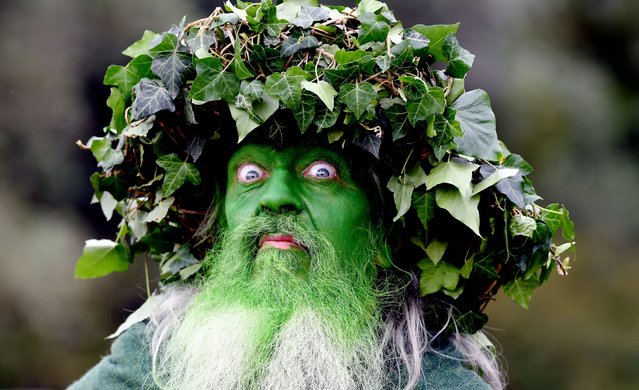 Barry Palterson, dressed as the Green Man, takes part in a Battle of Tewkesbury re-enactment in Gloucestershire, UK on July 13, 2024. More than 2,000 people play-fought on the site of the 1471 conflict in the town’s annual medieval festival. (Photo by Paul Nicholls/The Times)