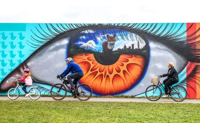 Portsmouth City Council received funding from the government for artists to get creative on an 80-metre-long hoarding at Hilsea Lido in Portsmouth, Hampshire. The street artworks were completed on Sunday afternoon, February 26, 2023. (Photo by Paul Jacobs/Picture Exclusive)