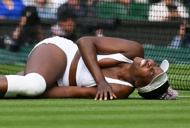 Venus Williams of USA lies on the floor with an injury during her first round defeat to Elina Svitolina of Ukraine during day one of The Championships Wimbledon 2023 at All England Lawn Tennis and Croquet Club on July 03, 2023 in London, England. (Photo by Karwai Tang)