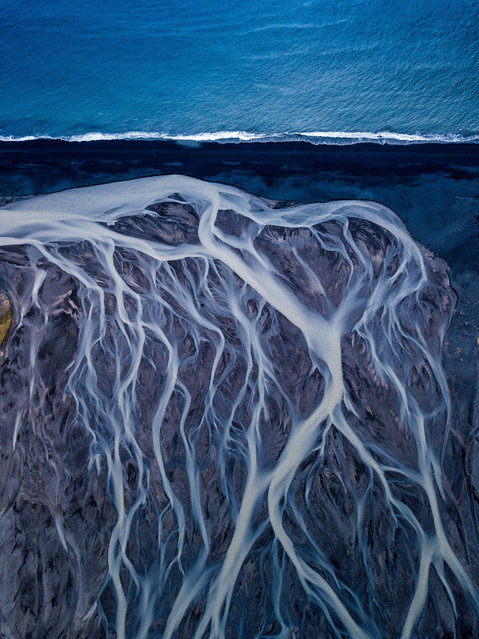 A glacial river flowing down to the Atlantic Ocean, Southern Iceland. Gold prize in nature art. (Photo by Dipanjan Pal/World Nature Photography Awards)