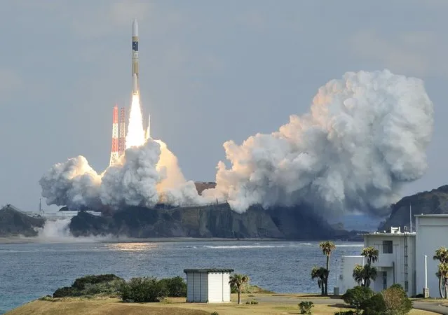 A H-IIA rocket, carrying a backup radar satellite for intelligence gathering by the government, lifts off from the launching pad at Tanegashima Space Center on the Japanese southwestern island of Tanegashima, in this photo taken by Kyodo February 1, 2015. (Photo by Reuters/Kyodo News)