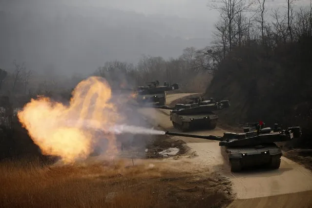 A South Korean army K-2 tank fires during an annual live-fire military exercise in Yangpyeong February 11, 2015. (Photo by Kim Hong-Ji/Reuters)