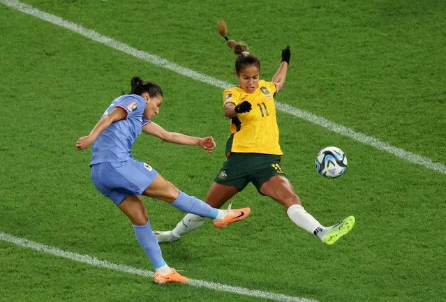France's midfielder #15 Kenza Dali kicks the ball in front of Australia's forward #11 Mary Fowler during the Australia and New Zealand 2023 Women's World Cup quarter-final football match between Australia and France at Brisbane Stadium in Brisbane on August 12, 2023. (Photo by Asanka Brendon Ratnayake/Reuters)