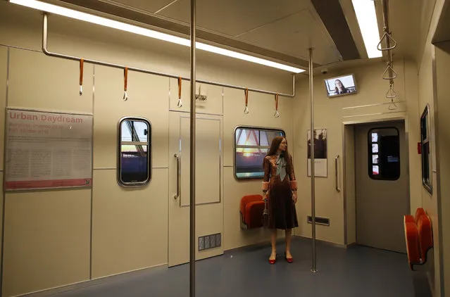 A view of a Gucci's advertisement campaign selected for an exhibition to celebrate creative vision of a creative director Alessandro Michele at Gucci Garden Archetypes, in Florence, Italy, Thursday, May 13, 2021. (Photo by Antonio Calanni/AP Photo)