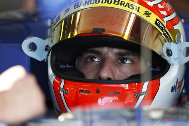 Sauber Formula One driver Felipe Nasr of Brazil sits in his car during the second practice session of the Australian F1 Grand Prix at the Albert Park circuit in Melbourne March 13, 2015.   REUTERS/Brandon Malone