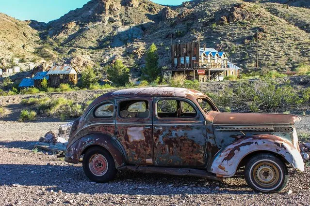 Images of an American ghost town that was home to gold mines and features a plane which crashed during the filming of 3000 Miles to Graceland starring Kevin Costner and Kurt Russell reveal the remnants of the once thriving location. An assortment of rusted vehicles which include a canary yellow bus, caravans and cars have all been left behind in the desert. Other pictures of Nelson, Nevada show its desolate surroundings with only a couple of houses and museums scattered around the area. In one shot, a derelict petrol pump stands still after making its final sale years ago. The stunning photographs were taken by an American photographer known as Abandoned Southeast on a visit to Nelson, Nevada. The area was called Eldorado by the Spaniards who made the original discoveries of gold in the town. The notorious Techatticup gold and silver mine which was associated with crime and murders ran in the area from 1861 to 1942. It was the richest mine in Southern Nevada. (Photo by Abandoned Southeast/Mediadrumworld.com)