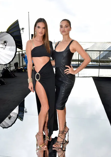 Brazilian-American model Alessandra Ambrosio (L) and Australian model of Lithuanian and Pakistani ancestry Shanina Shaik attend DUNDAS x REVOLVE NYFW Runway Show Casa Cipriani on September 08, 2021 in New York City. (Photo by Bryan Bedder/Getty Images for REVOLVE)