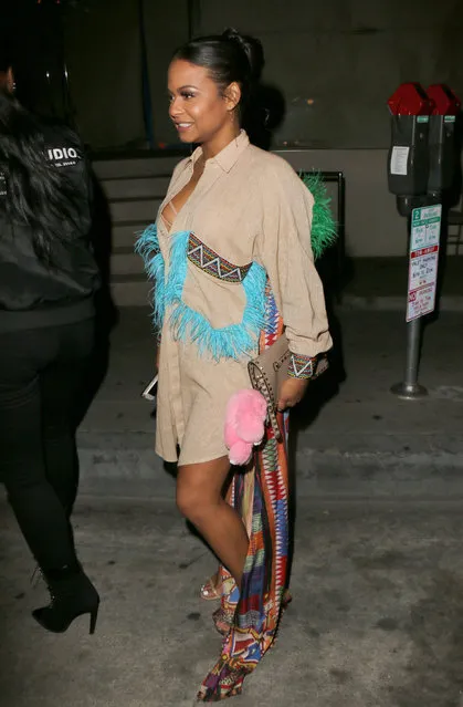 Christina Milian seen wearing a Native American style ensemble at Catch in West Hollywood. Her close friend Karrueche Tran was seen leaving separately, wearing loose army print cargo pants. Los Angeles, California,  Thursday January 26, 2017. (Photo by MHD/PacificCoastNews)