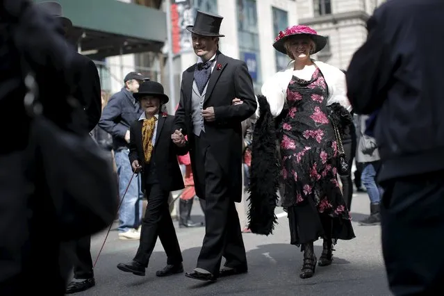 A family takes part in the annual Easter Parade and Bonnet Festival along 5th Avenue in New York City March 27, 2016. (Photo by Brendan McDermid/Reuters)