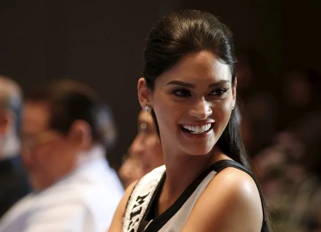 Miss Universe Pia Wurtzbach of the Philippines watches contestants (not pictured) of this year's Binibining Pilipinas (Miss Philippines), the winner of which will represent Philippines at the Miss Universe 2016 beauty contest,  during their presentation to the media at Quezon city, Metro Manila March 29, 2016. (Photo by Erik De Castro/Reuters)