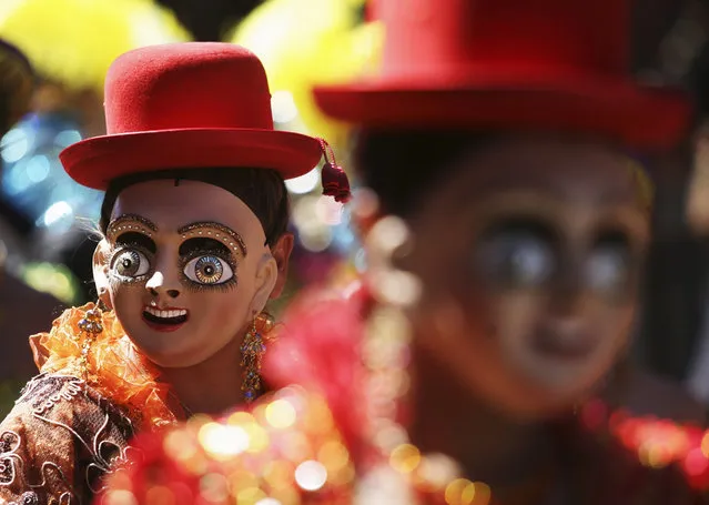 Members of the “Diablada Oruro” perform during the Carnival parade in Oruro, March 1, 2014. (Photo by Gaston Brito/Reuters)