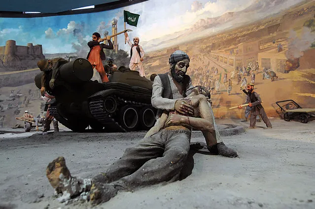 Detail of a tableau depicting victims of the Soviet invasion of Afghanistan, part of a display at the Jihad Museum, on August 8, 2009. (Photo by Shah Marai/AFP Photo via The Atlantic)