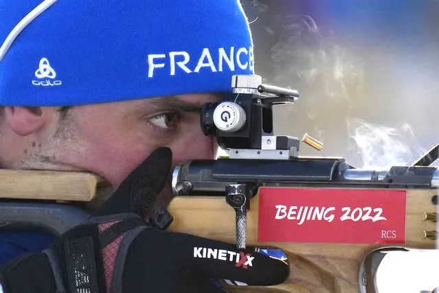 Quentin Fillon Maillet of France shoots during the men's 20-kilometer individual biathlon race at the 2022 Winter Olympics, Tuesday, February 8, 2022, in Zhangjiakou, China. (Photo by Kirsty Wigglesworth/AP Photo)