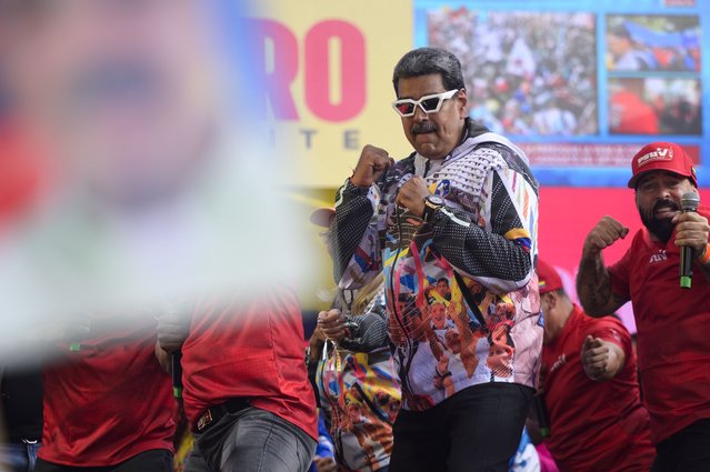 Nicolas Maduro, Venezuela's president, dances during a campaign rally in Caracas, Venezuela, on Tuesday, July 16, 2024. Venezuela's government is ramping up dollar sales to contain inflationary effects resulting from Maduro's presidential campaign spending. P(Photo by Gaby Oraa/Bloomberg via Getty Images)