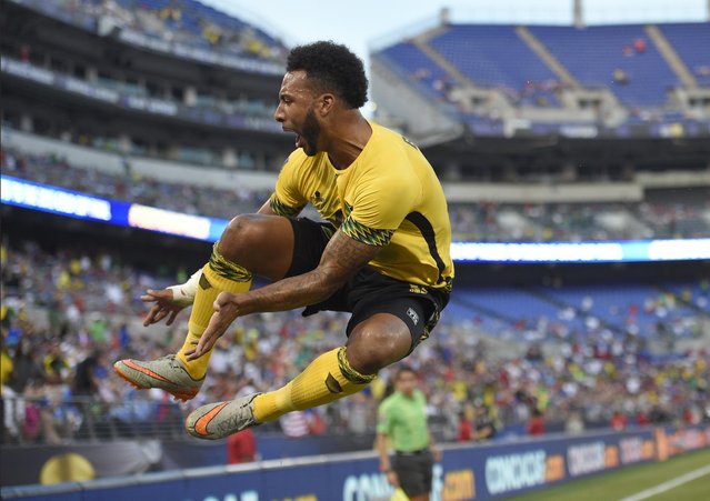 Jamaica forward Giles Barnes (9) celebrates his goal against Haiti during the first half of a CONCACAF Gold Cup soccer quarterfinal match, Saturday, July 18, 2015, in Baltimore. (Photo by Nick Wass/AP Photo)