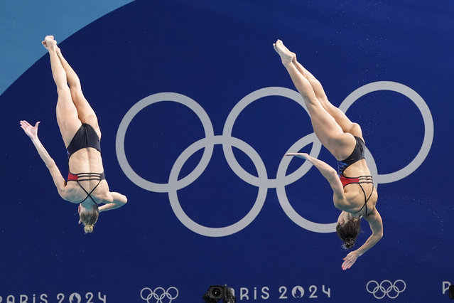 China's Chen Yiwen and Chang Yani compete in the women's synchronised 3m springboard diving final at the 2024 Summer Olympics, Saturday, July 27, 2024, in Saint-Denis, France. (Photo by Lee Jin-man/AP Photo)