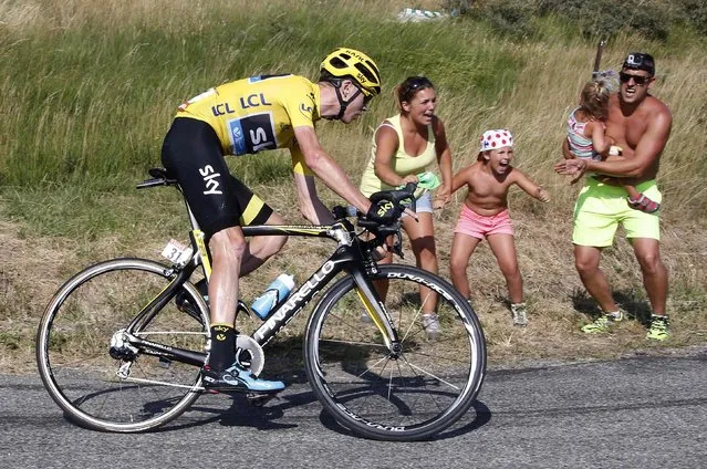 Team Sky rider Chris Froome of Britain, wearing the race leader's yellow jersey, speeds along the Manse pass during the 201-km (124 miles) 16th stage of the 102nd Tour de France cycling race from Bourg-de-Peage to Gap, France, July 20, 2015. (Photo by Eric Gaillard/Reuters)