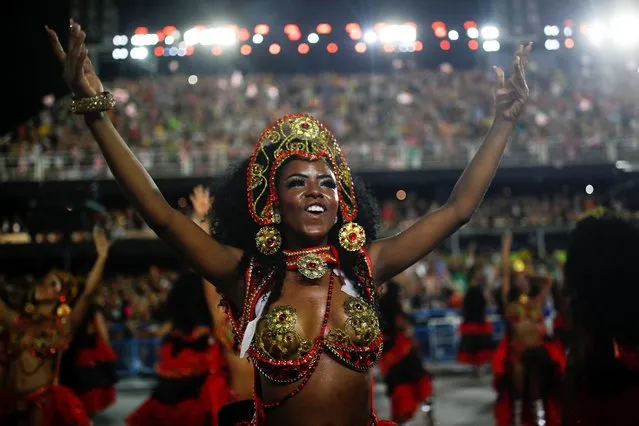  reveller from Salgueiro samba school performs during the first night of the Carnival parade at the Sambadrome in Rio de Janeiro, April 23, 2022. (Photo by Amanda Perobelli/Reuters)