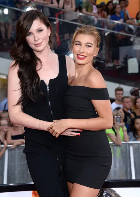 Ireland Baldwin, left, and Hailey Baldwin attend the premiere of “Mission: Impossible – Rogue Nation” in Times Square on Monday, July 27, 2015, in New York. (Photo by Evan Agostini/Invision/AP Photo)