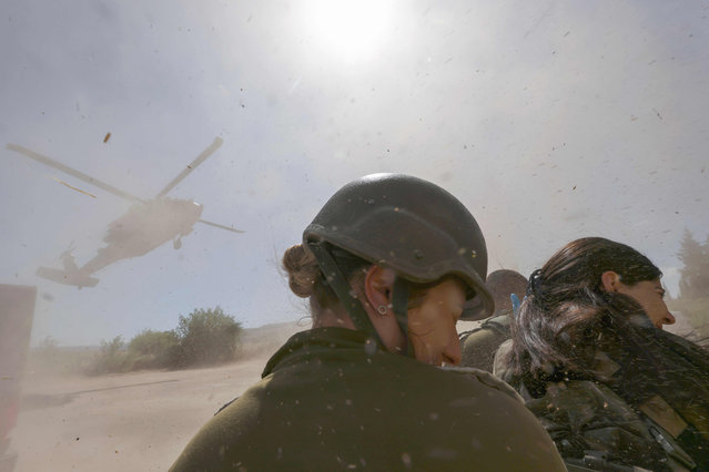 Israeli soldiers take part in the annual general military exercise 'Firm Hand' in the northern Kibbutz of Yiftah near the border with Lebanon on May 30, 2023. (Photo by Jalaa Marey/AFP Photo)