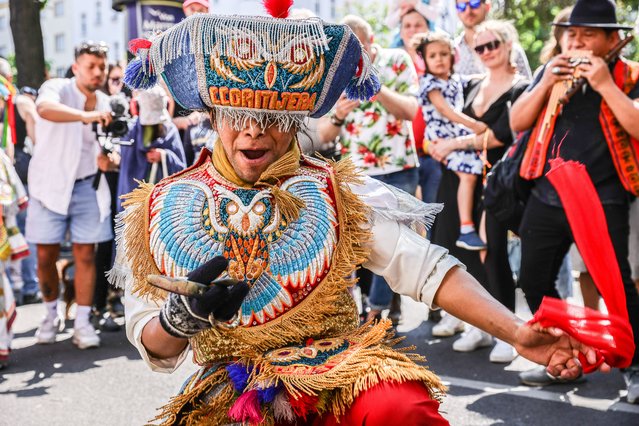 A dancer in Peruvian traditional outfit, during the annual Carnival of Cultures parade on May 28, 2023 in Berlin, Germany. The parade, one of Berlin's biggest annual street events, is resuming this year in full swing following a hiatus of several years due to the coronavirus pandemic. (Photo by Omer Messinger/Getty Images)