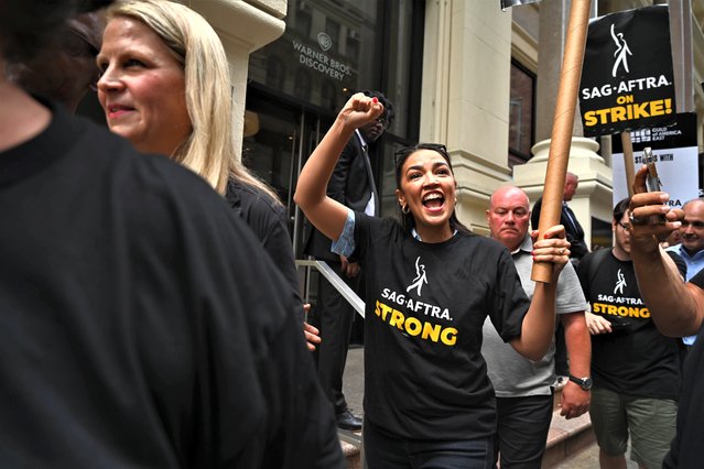 American politician and activist Alexandria Ocasio-Cortez walks the picket line in support of the Sag-Aftra and WGA strike in New York, US on July 24, 2023. (Photo by NDZ/Star Max/GC Images)