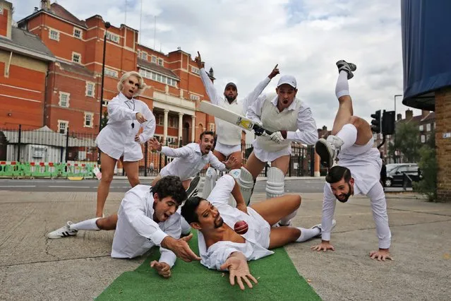 An Australian drag circus act pose for pictures during a photocall outside The Oval cricket ground on August 12, 2015 in London, England. The photocall comes one week ahead of the fifth and final Ashes Test Match at the ground when England will regain the Ashes trophy after already securing an unsurmountable lead. (Photo by Dan Kitwood/Getty Images)