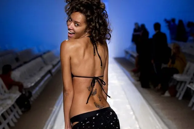 A model rehearses for the Wildfox Swim collection show. (J Pat Carter/Associated Press)