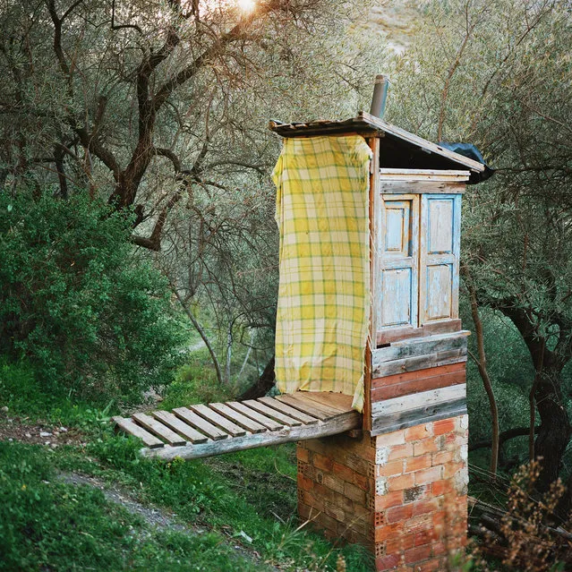 The English woman who owns this property got hit by a car while she was bicycling 20 years ago. With the money from her settlement, she bought property in Spain and began building DIY living structures like this composting toilet. (Photo by Antoine Bruy)