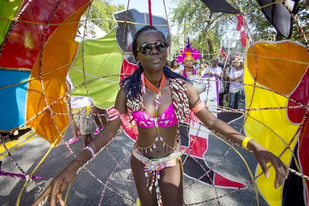 A participant dances during the West Indian Day Parade in Brooklyn, New York September 7, 2015. The parade, which takes place annually,  celebrates Caribbean culture and history. (Photo by Andrew Kelly/Reuters)