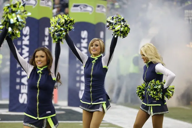 Seattle Seahawks cheerleaders perform during the first half of the NFL football NFC Championship game against the San Francisco 49ers Sunday, January 19, 2014, in Seattle. (Photo by Elaine Thompson/AP Photo)