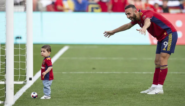 Justin Meram #9 of Real Salt Lake cheers his son Sebastian on as he kicks a ball into the goal after Real Salt Lake beat the Portland Timbers to advance to the playoffs October 9, 2022 America First Field in Sandy, Utah. (Photo by Chris Gardner/Getty Images)