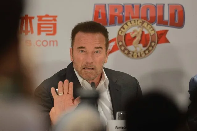 US actor and former California governor Arnold Schwarzenegger gestures to journalists at the conclusion of a press conference in Hong Kong on August 19, 2016, ahead of the Arnold Classic Asia Multi-Sport Festival to be held on August 20-21. Hollywood action hero Arnold Schwarzenegger launched a new sports festival in Hong Kong on August 19, telling the stressed-out city to remember to balance mind and body. (Photo by Tengku Bahar/AFP Photo)