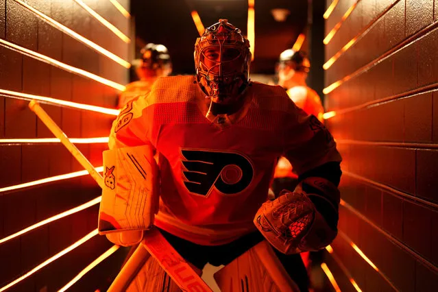 Philadelphia Flyers' Carter Hart waits to step out onto the ice before an NHL hockey game against the Carolina Hurricanes, Saturday, October 29, 2022, in Philadelphia. (Photo by Matt Slocum/AP Photo)