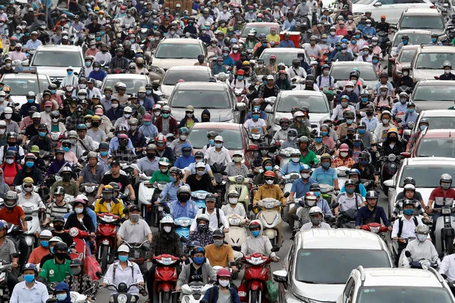 Traffic jam is seen in morning rush hour after the government eased nationwide lockdown following the coronavirus disease (COVID-19) outbreak in Hanoi, Vietnam on May 25, 2020. (Photo by Kham via Reuters)