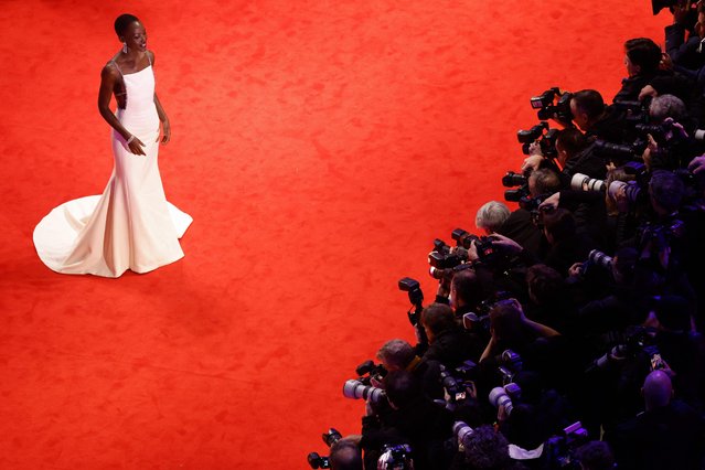 Kenyan-Mexican actress and President of the International Jury 2024 Lupita Nyong'o poses on the red carpet prior to the opening ceremony of the 74th Berlinale, Europe's first major film festival of the year, in Berlin on February 15, 2024. (Photo by Odd Andersen/AFP Photo)