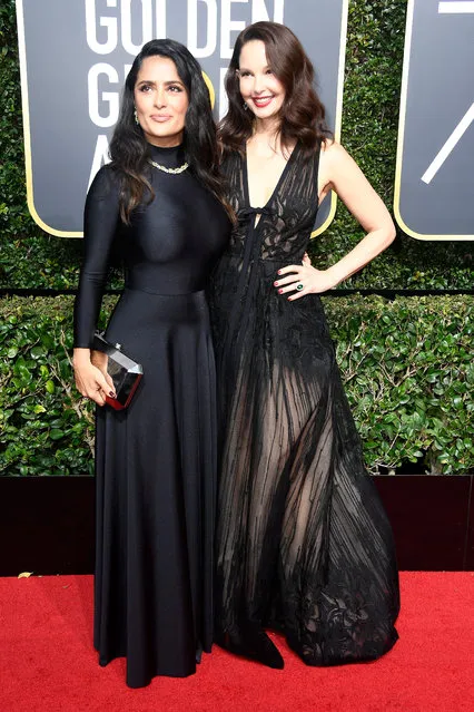 Actors Salma Hayek (L) and Ashley Judd attend The 75th Annual Golden Globe Awards at The Beverly Hilton Hotel on January 7, 2018 in Beverly Hills, California. (Photo by Frazer Harrison/Getty Images)