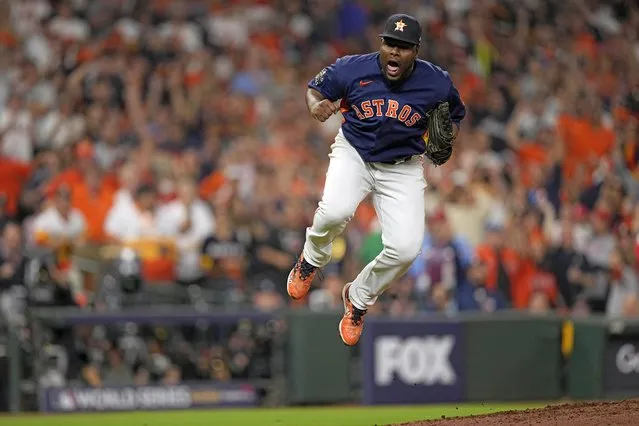 Houston Astros relief pitcher Hector Neris celebrates the last out in the top of the seventh inning in Game 6 of baseball's World Series between the Houston Astros and the Philadelphia Phillies on Saturday, November 5, 2022, in Houston. (Photo by David J. Phillip/AP Photo)