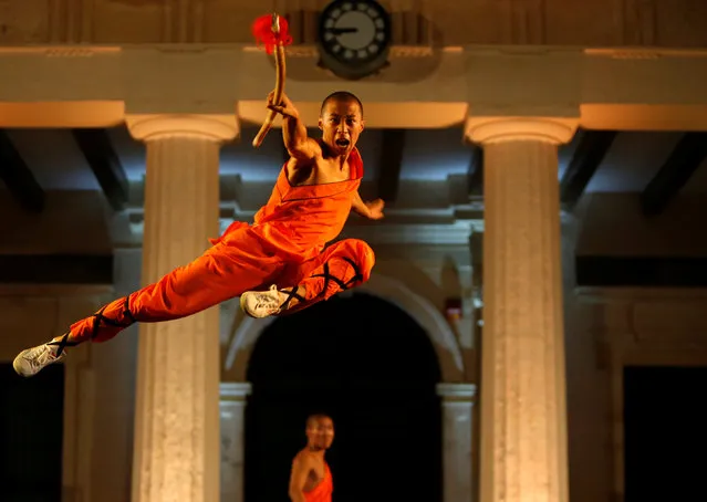 A Shaolin monk of the Dengfeng Zhongyue Shaolin Boxing Culture Troupe from Henan Province in China perform in Valletta, Malta, September 17, 2016. (Photo by Darrin Zammit Lupi/Reuters)