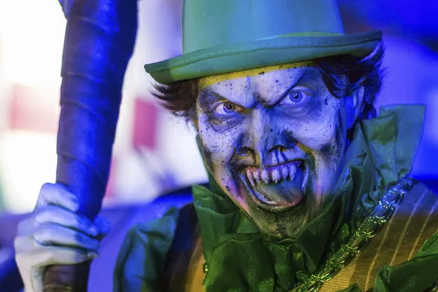 An actor dressed as a leprechaun performs at the Hopi Hari horror theme amusement park, in the Vinhedo suburb of Sao Paulo, Brazil, Friday, September 4, 2020. (Photo by Carla Carniel/AP Photo)