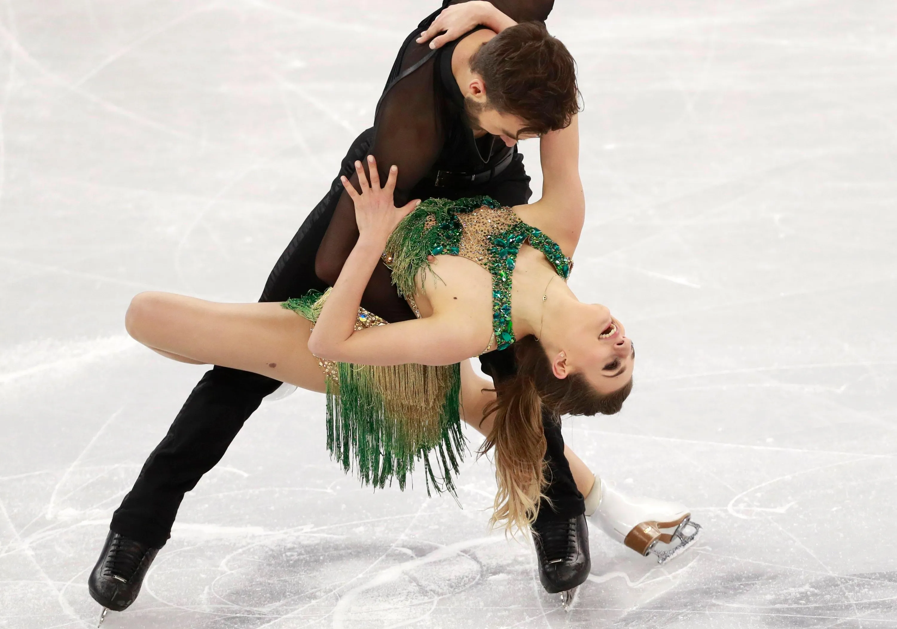Gabriella Papadakis and Guillaume Cizeron of France compete in the Ice Danc...