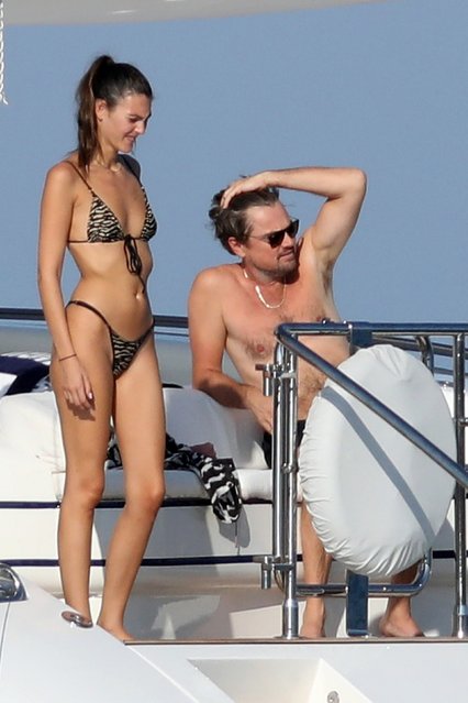Leonardo DiCaprio and model Vittoria Ceretti spent time on a luxury yacht off Formentera, Spain on August 17, 2025. After swimming, Vittoria wrapped Leo in a towel in an affectionate moment. The couple Could also be seen kissing inside the yacht. (Photo by Backgrid UK)