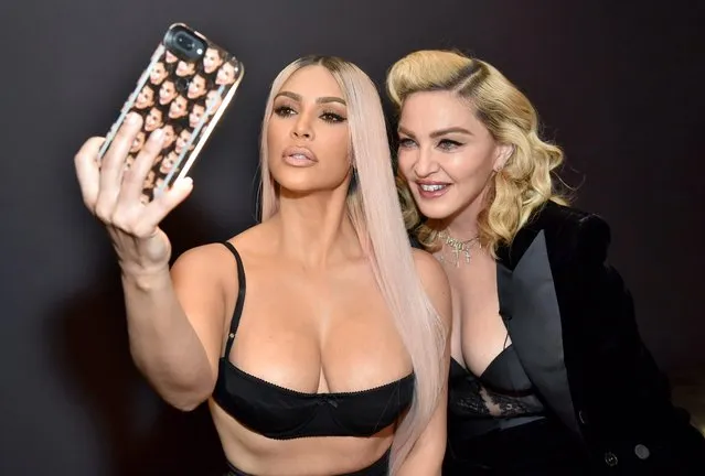 Kim Kardashian west and Madonna backstage at MDNA SKIN hosts Madonna and Kim Kardashian West for a beauty conversation at YouTube Space LA on March 6, 2018 in Los Angeles, California. (Photo by Kevin Mazur/Getty Images for Madonna's MDNA SKIN)