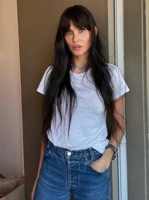 American actress Demi Moore on October 6, 2025 rocks bangs for her role in a short film from Gucci – in a throwback to her “Striptease” role. (Photo by demimoore/Instagram)