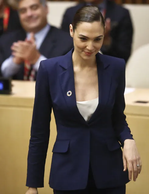 Gal Gadot, star of the upcoming film, “Wonder Woman”, takes the podium to address a U.N. meeting to designate Wonder Woman as an Honorary Ambassador for the Empowerment of Women and Girls, Friday, October 21, 2016 at U.N. headquarters. (Photo by Bebeto Matthews/AP Photo)