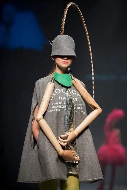 A model showcases designs by Andy Ho on the runway during the Brand Collections' Show on day 1 of Hong Kong Fashion Week Fall/Winter 2015 at the Hong Kong Convention and Exhibition Centre on January 19, 2015 in Hong Kong. (Photo by Anthony Kwan/Getty Images)