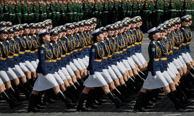 Russian servicewomen march in formation during the Victory Day military parade general rehearsal in the Red Square in Moscow, Russia, 07 May 2021. The Victory Day military parade will take place 09 May 2021 in the Red Square to mark the victory of the Soviet Union over the Nazi Germany in the World War II. (Photo by Yuri Kochetkov/EPA/EFE)