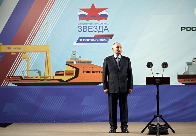 In this pool photograph distributed by Sputnik agency Russia's President Vladimir Putin attends the naming ceremony of the Arctic tanker-gas carrier “Alexey Kosygin” and the tanker-shuttle “Valentin Pikul” at the Zvezda shipbuilding complex, in Primorsky Krai region on September 11, 2023. (Photo by Alexei Danichev/Pool via AFP Photo)