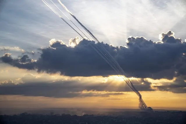 Rockets are fired toward Israel from Gaza, Saturday, October 7, 2023. (Photo by Fatima Shbair/AP Photo)